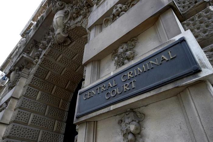 A British judge sentenced a Ugandan woman to 11 years in jail for performing female genital mutilation on her three-year-old daughter, calling the mother's crime "barbaric"