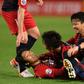 Hero super-sub: Sho Ito (second left is mobbed by teammates after scoring against Shandong Luneng