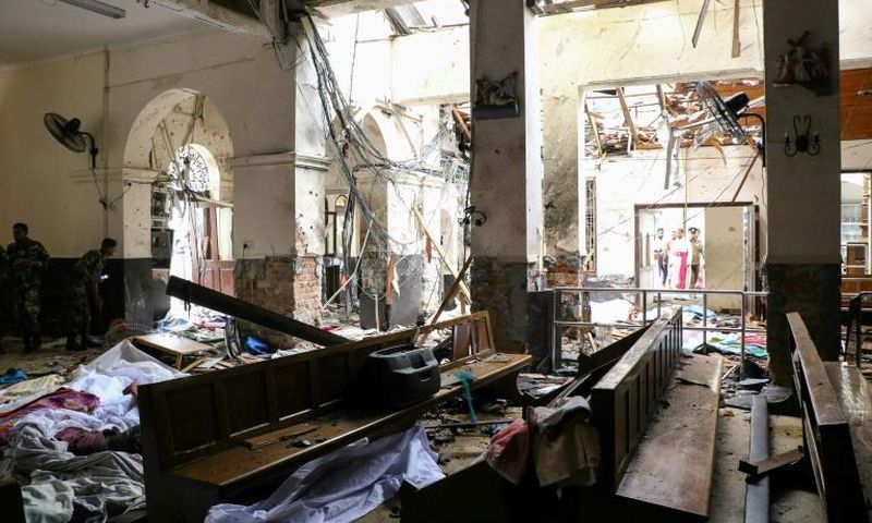 All three churches, including St. Anthony's Shrine, were left in ruins, bodies slumped over pews or lined up in aisles, torn bibles strewn over the floor