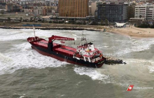 This aerial framegrab from the Italian Coast Guards shows a Turkish-flagged cargo ship after it ran ashore on a beach in Bari due to bad weather conditions