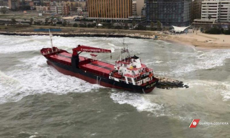 This aerial framegrab from the Italian Coast Guards shows a Turkish-flagged cargo ship after it ran ashore on a beach in Bari due to bad weather conditions