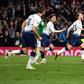 Tottenham's Christian Eriksen fired his side to a late win over Brighton