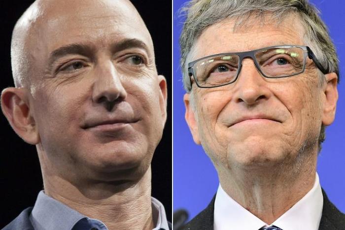 Amazon founder Jeff Bezos (L) and Microsoft co-founder Bill Gates are the richest persons in the world, according to Forbes
