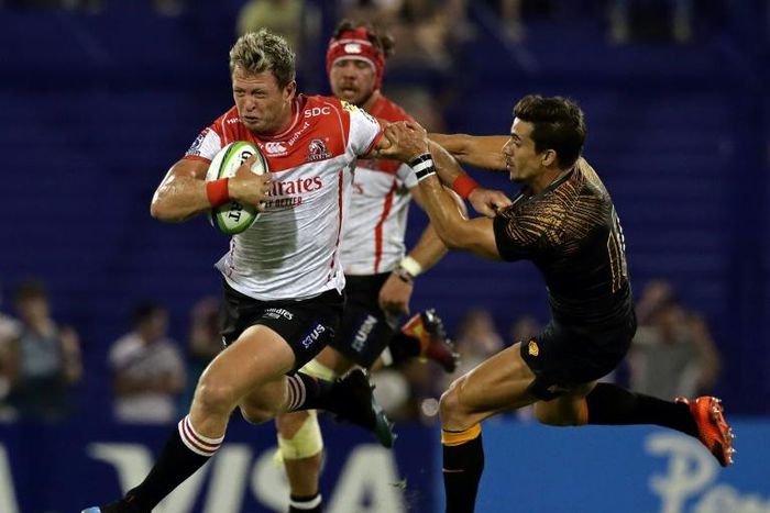 South Africa's Lions fullback Ruan Combrinck (L) vies for the ball with Argentina's Jaguares fly half Joaquin Diaz Bonilla during their Super Rugby match at Jose Amalfitani stadium in Buenos Aires, on February 16, 2019.