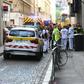 French security and emergency workers block the area following a package bomb blast along a pedestrian street in the heart of Lyon on May 24, 2019