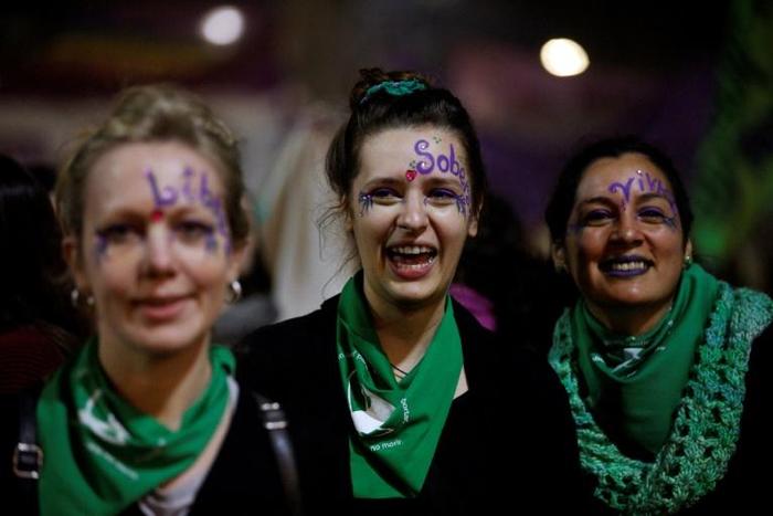 Protesters in Buenos Aires sported the green and purple favored by women's rights groups in Argentina
