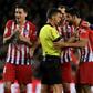 Atletico Madrid's Spanish forward Diego Costa confronts referee Gil Manzano during the Spanish league match against Barcelona