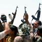 Iraqi government forces and members of the Popular Mobilisation units, forces dominated by Iran-backed Shiite armed groups, on the front line during the fight against the Islamic State group