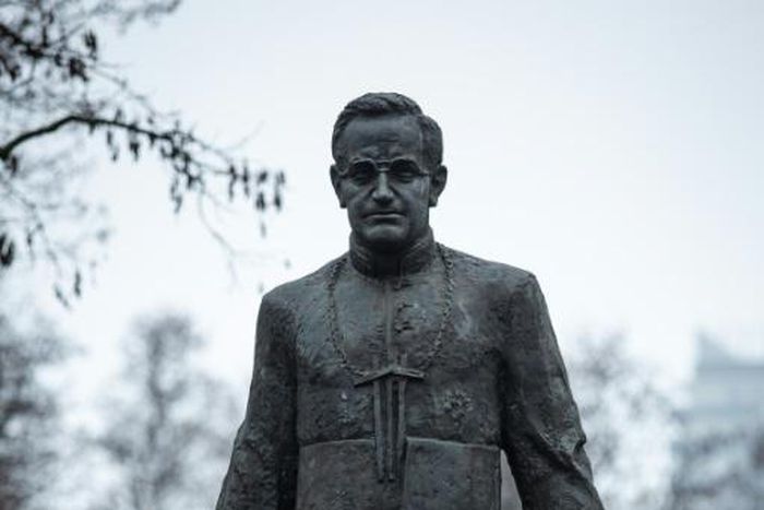 Video footage on social media showed men using a rope to topple the statue of Father Henryk Jankowski, pictured December 2018 after it was vandalized with paint over the accusations against him of paedophilia