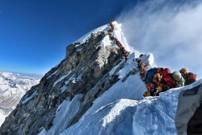 A photo taken by Nirmal Purja of Project Possible - who is aiming to climb all 14 of the world's 8,000 metre-plus peaks - shows heavy traffic of climbers lining up to summit Mount Everest