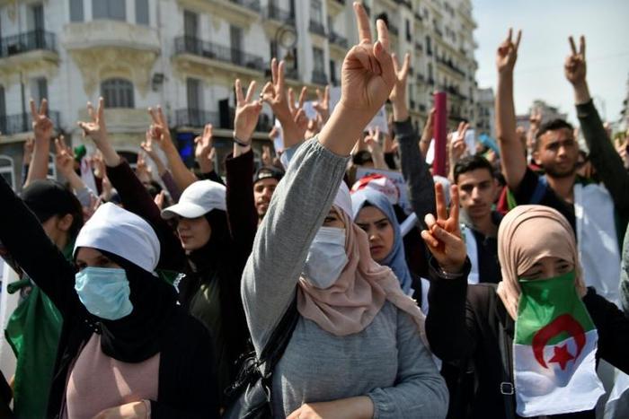Algerian students protest against the "system" in the capital Algiers on April 23, 2019
