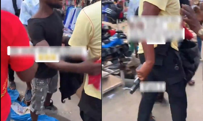 Police officer slaps alleged thief with gun during confrontation at Adum