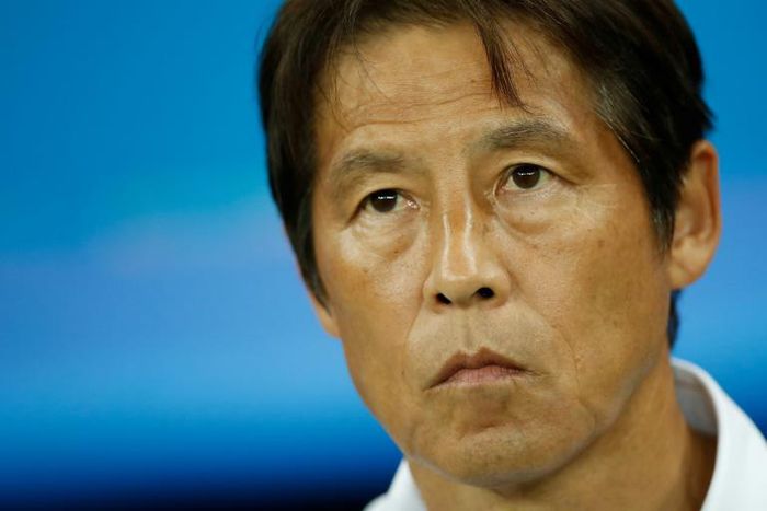 Japan's coach Akira Nishino looks on before the Russia 2018 World Cup round of 16 football match between Belgium and Japan at the Rostov Arena in Rostov-On-Don on July 2, 2018.