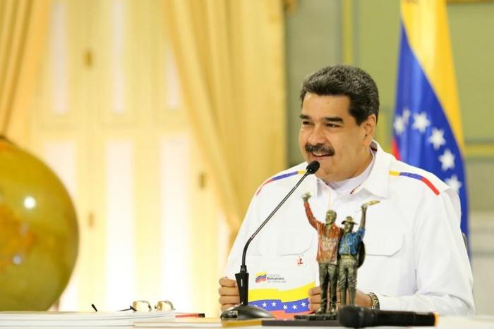 President Nicolas Maduro, shown in this June 5, 2019 photo at his Miraflores Palace in Caracas, blames the country's blackouts on sabotage by the United States and the Venezuelan opposition