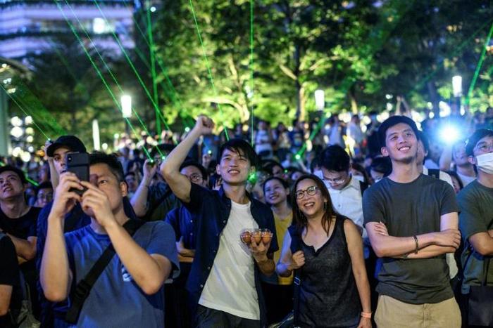 The protest coincided with a nightly laser and light show sponsored by the government