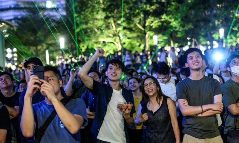 The protest coincided with a nightly laser and light show sponsored by the government