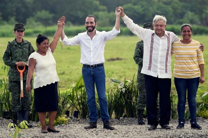 Salvadorean President Nayib Bukele (2-L) and Mexican counterpart Andres Manuel Lopez Obrador (2-R) pose during a tree planting ceremony in Tapachula, Chiapas state, Mexico on June 20, 2019