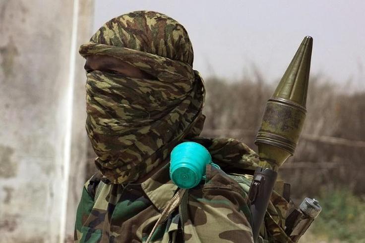 A fighter loyal to the Shabaab, a jihadist group that controls swathes of Somali countryside, drills in a village near Mogadishu in February 2011