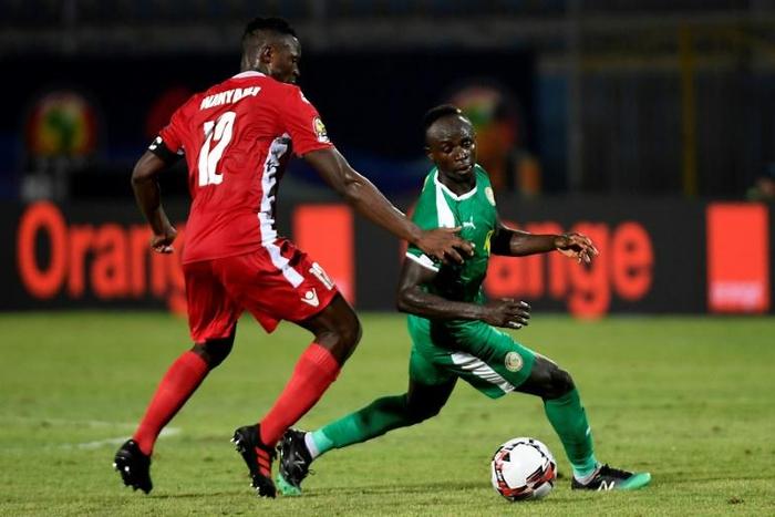 Senegal star Sadio Mane (R) contests possession with Kenyan Victor Wanyama at the Africa Cup of Nations