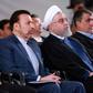 A handout picture provided by the Iranian presidency on August 27, 2019, shows President Hassan Rouhani (2 L) attending a ceremony in the capital Tehran