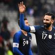 Marseille defender Adil Rami, shown playing for France, has been sacked by the club, reportedly for 'gross misconduct'