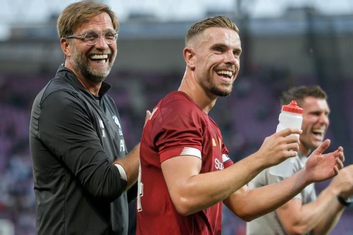 Jordan Henderson says Liverpool manager Jurgen Klopp (left) 'knows better than everyone else' about signings