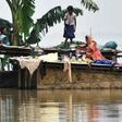 In India, heavy rains since the start of July have killed at least 467 people with many districts in Uttar Pradesh, Bihar and Assam (pictured) states cut off because of flooding