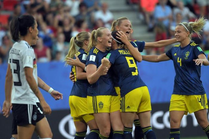 Sweden players celebrete after Stina Blackstenius scored what proved to be the winner for her team in their World Cup quarter-final against Germany