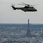 A French Eurocopter AS 532 Cougar flying during a rehearsal ahead of the Bastille day military air parade