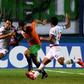 Argentina Banfield forward Julian Carranza, in center battling two defenders from Uruguay's Nacional, was among the first two players signed Friday by David Beckham's MLS expansion club Inter Miami, which takes the field in 2020