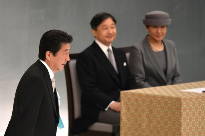 Abe and Naruhito stuck closely to their prepared remarks