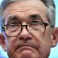 (FILES) In this file photo taken on July 10, 2019 Federal Reserve Board Chairman Jerome Powell testifies during a full committee hearing on "Monetary Policy and the State of the Economy" in Washington,DC. Risk from severe weather events is not usually ...