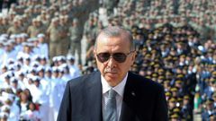 Turkish President Recep Tayyip Erdogan (C) has come under fire for undermining judicial independence