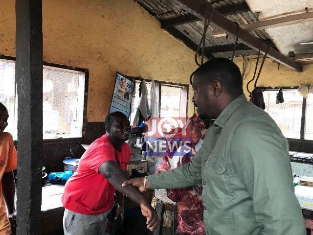 John Dumelo in Tesano market