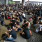 Protesters gather outside government headquarters in a fresh show of strength against the city's leader
