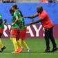 Cameroon coach Alain Djeumfa (R) said his players remained 'very professional' throughout their bad-tempered 3-0 defeat against England on Sunday