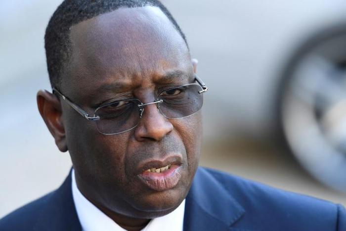 A former journalist has been charged for "offending" Senegal's President Macky Sall, pictured