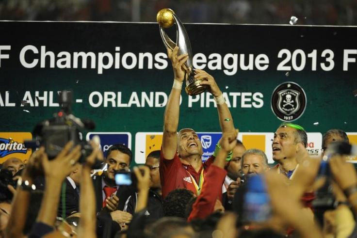 Egypt legend Wael Gomaa lifts the CAF Champions League trophy after Al Ahly won the 2013 final