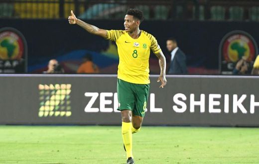 South Africa's midfielder Bongani Zungu celebrates after scoring during the 2019 Africa Cup of Nations (CAN) Group D football match between South Africa and Namibia at the Al Salam Stadium in the Egyptian capital Ciaro on June 28, 2019.