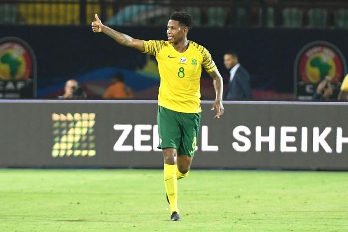South Africa's midfielder Bongani Zungu celebrates after scoring during the 2019 Africa Cup of Nations (CAN) Group D football match between South Africa and Namibia at the Al Salam Stadium in the Egyptian capital Ciaro on June 28, 2019.