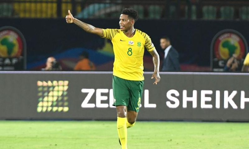 South Africa's midfielder Bongani Zungu celebrates after scoring during the 2019 Africa Cup of Nations (CAN) Group D football match between South Africa and Namibia at the Al Salam Stadium in the Egyptian capital Ciaro on June 28, 2019.