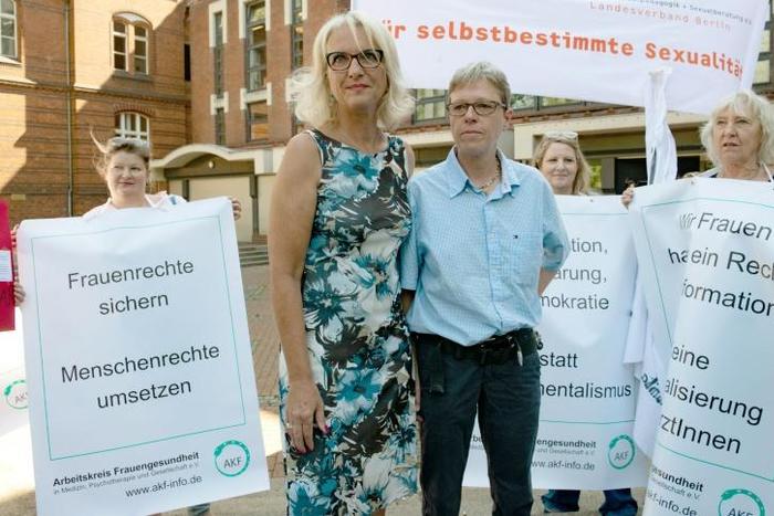 Supporters stand by doctors Bettina Gaber and Verena Weyer outside the Berlin district court as both vow to appeal their fines