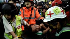 "We express the strongest condemnation of these terrorist-like actions," a Chinese official said calling the two men beaten by demonstrators "mainland China compatriots"