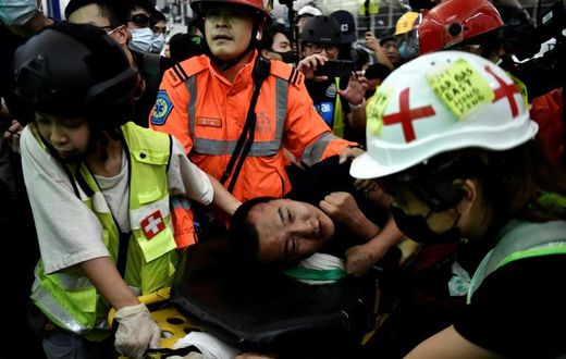 "We express the strongest condemnation of these terrorist-like actions," a Chinese official said calling the two men beaten by demonstrators "mainland China compatriots"
