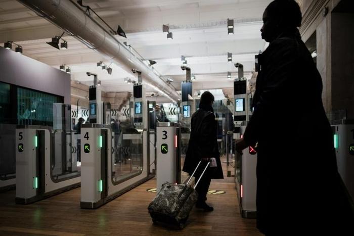 A Eurostar passenger going through an automated ePassport gate equiped with a facial recognition system the gare du Nord in Paris: Canada and the Netherlands hope to reproduce the experience on trans-Atlantic flights by 2020