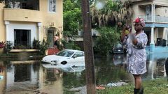 Storm, brimming with rain, barrels toward waterlogged Louisiana