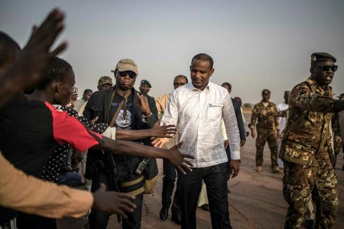 Malian Prime Minister Boubou Cisse greets supporters on visiting in Sevare, central Mali