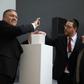 US Secretary of State Mike Pompeo lights a candle next to Argentine Foreign Minister Jorge Faurie and the president of the Asociacion Mutual Israelita Argentina (AMIA) Ariel Eichbaum to pay homage to the victims of a bombing at the center which left 85...