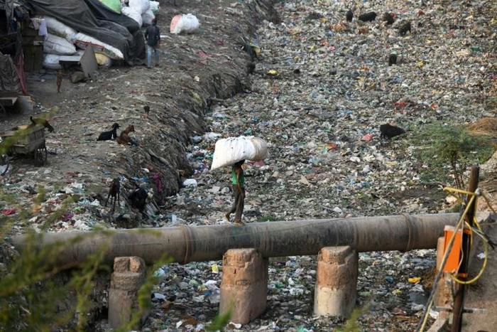 Coming mostly from tap and especially bottled water, nearly invisible bits of polymer were also found in shellfish, beer and salt, a report by scientists and the University of Newcastle in Australia found
