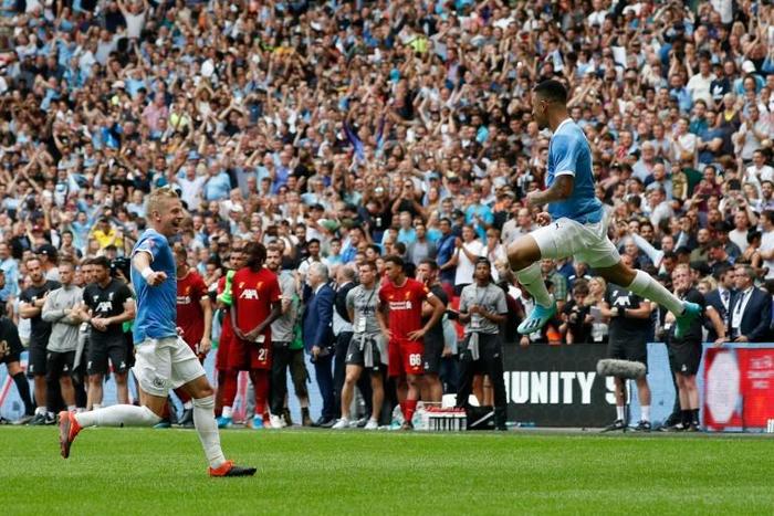 Manchester City's Gabriel Jesus celebrates after converting the winning penalty in the Community Shield